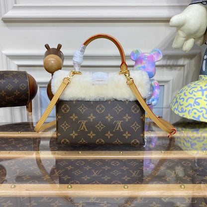 Louis Vuitton Monogram Canvas and Shearling Locky BB M46318