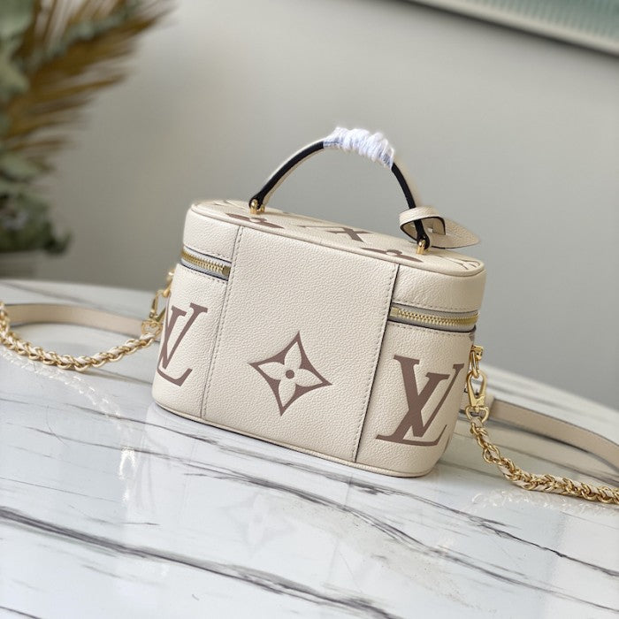 LV Monogram Empreinte Bicolor Vanity PM M45599